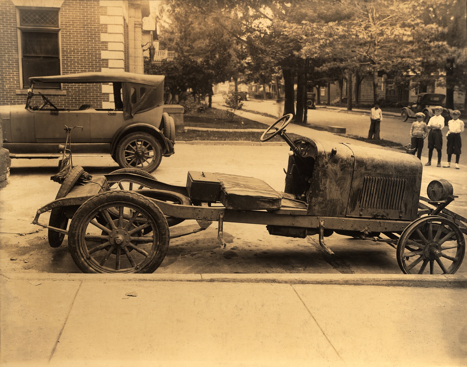 Old Jalopy parked between City Hall & Pennzoil Building - Boylston St