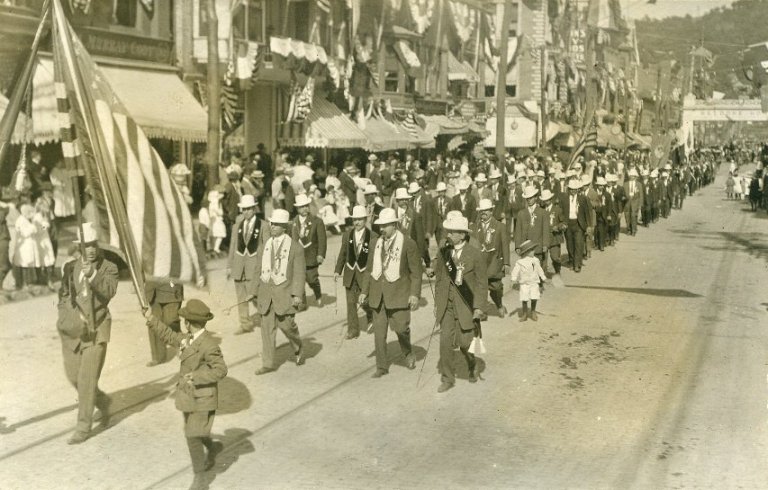 men in white derbies