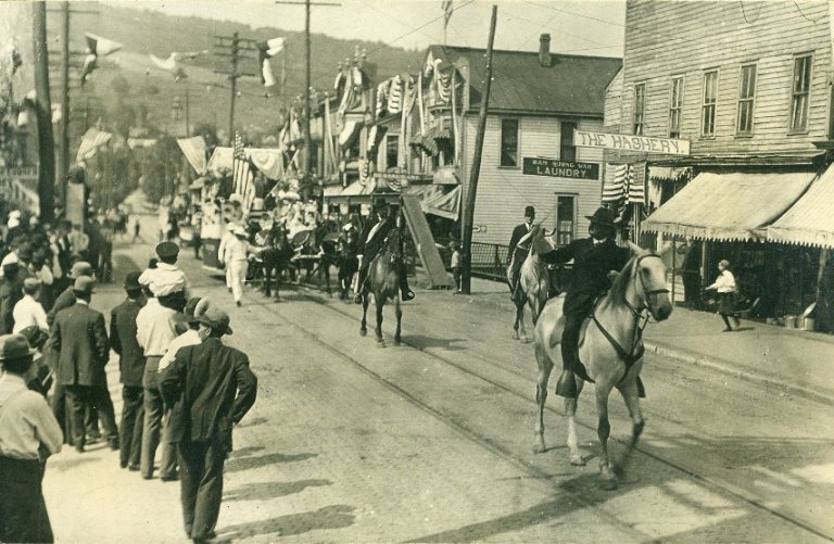 white horse at the lead